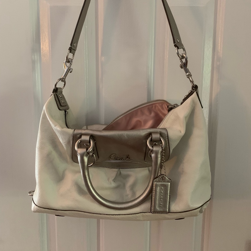 Gray and white Coach bag